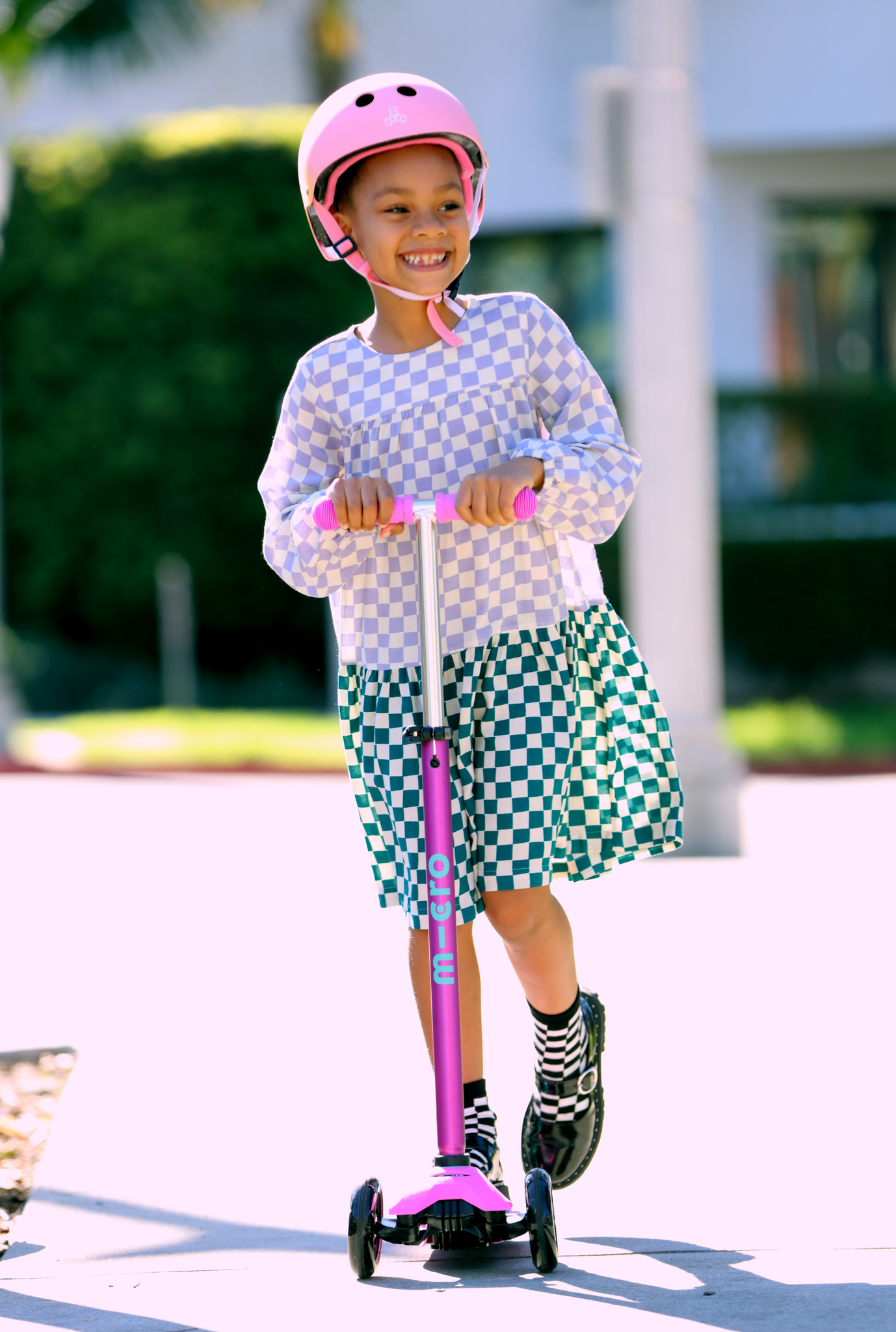 A child joyfully plays with a colorful toy rocket, imagining adventures in space.