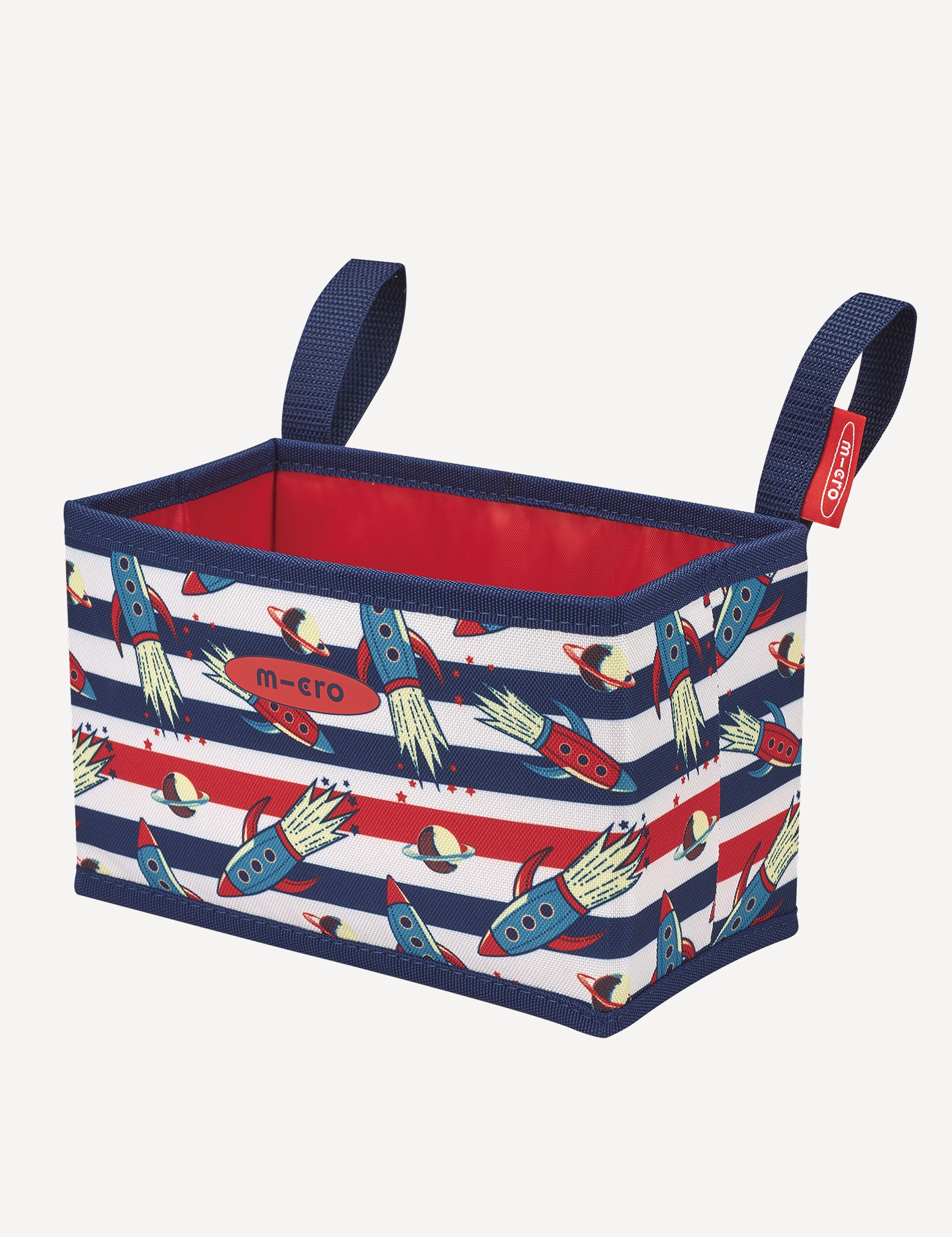 A multicolored scooter basket with a rocket pattern and blue straps