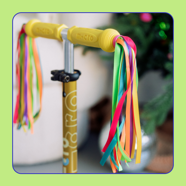 Micro Scooter Streamers are shown attached to a Micro scooter. 