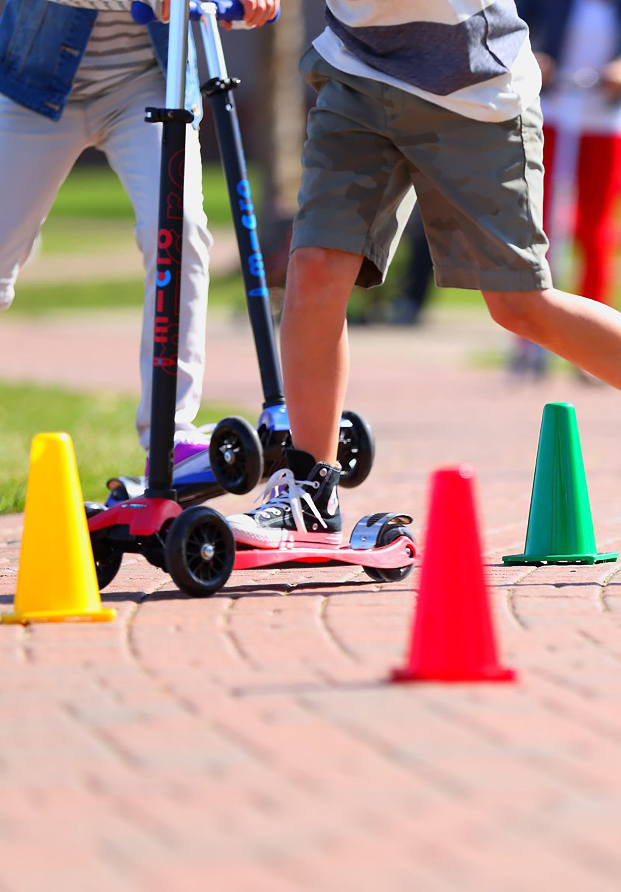 Kids riding Micro scooters with Scooter Cones